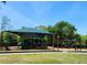 The community playground with shaded area to keep cool on hot days at 16311 Colwood Dr, Odessa, FL 33556
