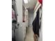 Spacious walk-in closet offers ample storage with built-in shelving and hanging rods at 16311 Colwood Dr, Odessa, FL 33556