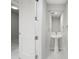 Elegant powder room featuring a pedestal sink, large mirror and light gray walls for a modern, minimalist look at 301 1St S St # 1605, St Petersburg, FL 33701