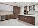 Bright kitchen with white countertops, stainless steel appliances and dark wood cabinetry at 301 1St S St # 1605, St Petersburg, FL 33701