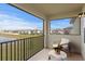 Relaxing balcony offering serene views of a pond and neighborhood at 32346 Sapna Chime Dr, Wesley Chapel, FL 33545