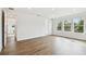 Spacious bedroom with hardwood floors, natural light, and neutral paint at 509 N Bradford Ave, Tampa, FL 33609