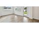 Bright living room with wood floors and natural light at 509 N Bradford Ave, Tampa, FL 33609