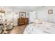 Comfortable bedroom featuring a dresser, closet, and soft textures, creating a relaxing retreat at 6029 Bayway Ct, New Port Richey, FL 34652