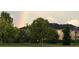 Exterior view of the community building with a colorful rainbow at 650 Saxony Blvd, St Petersburg, FL 33716