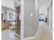 Hallway view showcasing a luxurious shower, tub, and vanity at 650 Saxony Blvd, St Petersburg, FL 33716