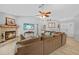 Inviting living room with a cozy fireplace, and neutral tones at 7213 Jones Rd, Odessa, FL 33556