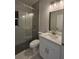Modern bathroom with a sliding glass shower and new sink at 13224 Foresman Blvd, Port Charlotte, FL 33981