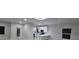 Bright kitchen features white cabinets, stainless appliances, breakfast bar and a modern design at 13224 Foresman Blvd, Port Charlotte, FL 33981