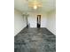 Spacious bedroom featuring dark brick flooring, with natural light and convenient access to other areas of the home at 200 Country Club Dr # 407, Largo, FL 33771