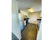Well-appointed kitchen featuring updated appliances and sleek dark countertops complemented by ample storage space at 200 Country Club Dr # 407, Largo, FL 33771