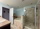 Bright bathroom featuring tile flooring, separate shower and tub, and a neutral color palette at 20314 Starfinder Way, Tampa, FL 33647
