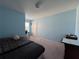Comfortable bedroom with soft carpet, a ceiling fan, and bright walls at 20314 Starfinder Way, Tampa, FL 33647