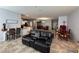 Inviting living area with tile floors, open to the kitchen, and a cozy seating arrangement at 20314 Starfinder Way, Tampa, FL 33647