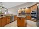 Large kitchen showcases stainless steel appliances and granite countertops at 3830 Moreno Dr, Palm Harbor, FL 34685