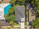 A well-maintained property features a manicured lawn and modern outdoor living space at 4406 W Euclid Ave, Tampa, FL 33629