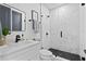 Bathroom featuring a modern design, glass shower, and black hardware at 4406 W Euclid Ave, Tampa, FL 33629