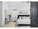 Bright bedroom with a modern bed, stylish decor, and natural light from the window at 4406 W Euclid Ave, Tampa, FL 33629