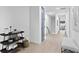 Hallway area with minimalist decor, leading to other rooms in the home at 4406 W Euclid Ave, Tampa, FL 33629