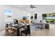 Open-concept living and dining area offering plenty of natural light and views of the backyard at 4406 W Euclid Ave, Tampa, FL 33629