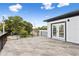 Spacious outdoor patio with a black metal railing and a view of the surrounding neighborhood at 4406 W Euclid Ave, Tampa, FL 33629
