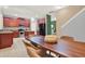 Well-designed kitchen and dining area with stainless steel appliances and ample cabinet space at 7718 Landcare Ln, Tampa, FL 33616