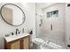 Charming bathroom with a shower and decorative tile flooring at 1802 E Park Cir, Tampa, FL 33610