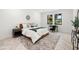 Cozy bedroom with a decorative rug and desk space at 1802 E Park Cir, Tampa, FL 33610