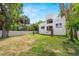 Beautiful home with a manicured lawn, offering a blend of elegance and natural beauty at 1802 E Park Cir, Tampa, FL 33610