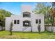 Stunning home showcasing its unique architecture and well-maintained landscaping at 1802 E Park Cir, Tampa, FL 33610