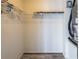 Walk-in closet features wire shelving and vinyl flooring at 1849 Abrico Dr # 4, Lutz, FL 33558