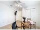 Bright bedroom with a ceiling fan and tile floors, offering a comfortable and functional space at 29523 Waggle Dr, San Antonio, FL 33576