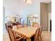 Open-concept dining room flows seamlessly into living and kitchen areas for easy entertaining at 29523 Waggle Dr, San Antonio, FL 33576