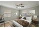 Inviting bedroom with a comfortable bed, neutral toned walls, and warm natural light at 4101 W Leila Ave, Tampa, FL 33616