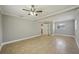 A wide open living room featuring neutral tones, ceiling fan, and tile flooring at 4101 W Leila Ave, Tampa, FL 33616