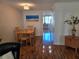 Charming dining area with a wooden table and chairs, perfect for Gathering meals at 4915 Bay Ne St # 322, St Petersburg, FL 33703