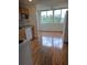 Bright kitchen featuring wood cabinets, modern appliances, and a window with natural light at 4915 Bay Ne St # 322, St Petersburg, FL 33703