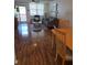 Inviting living room with wood flooring, comfortable seating, and plenty of natural light at 4915 Bay Ne St # 322, St Petersburg, FL 33703