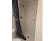 Shower includes marble-patterned tile, shower head, and modern faucet at 4915 Bay Ne St # 322, St Petersburg, FL 33703