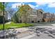 Charming three-car garage townhome with a manicured lawn and private second story balcony at 8835 Moonlit Meadows Loop, Riverview, FL 33578