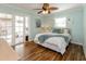Bedroom with sliding glass doors opening to an outdoor patio space at 12261 Eldon Dr, Largo, FL 33774