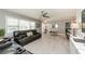 Expansive living space with an open layout, combining dining and living areas for seamless entertaining at 12261 Eldon Dr, Largo, FL 33774