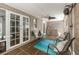 Enclosed patio with seating and outdoor bar area at 12261 Eldon Dr, Largo, FL 33774