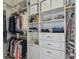 Organized walk-in closet with shelves and hanging rods for optimal storage at 700 S Harbour Island Blvd # 802, Tampa, FL 33602