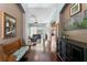 Spacious foyer with hardwood floors, arched doorways, and seamless flow into the living areas at 8205 Prairie Ridge Way, Tampa, FL 33647