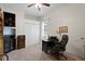 Office space with desk, computer, and closet for storage, suitable for remote work at 8205 Prairie Ridge Way, Tampa, FL 33647
