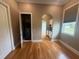 Interior laundry room with stacked washer and dryer and a view of wet bar at 8503 Kentucky Derby Dr, Odessa, FL 33556