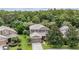 Beautiful home with a private backyard backing up to a lush forest and tree canopy at 19308 Sunset Bay Dr, Land O Lakes, FL 34638