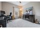 Cozy room with desk, media center, and accent art at 19308 Sunset Bay Dr, Land O Lakes, FL 34638