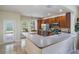 Bright kitchen with stainless steel appliances, breakfast bar and access to the backyard at 19308 Sunset Bay Dr, Land O Lakes, FL 34638